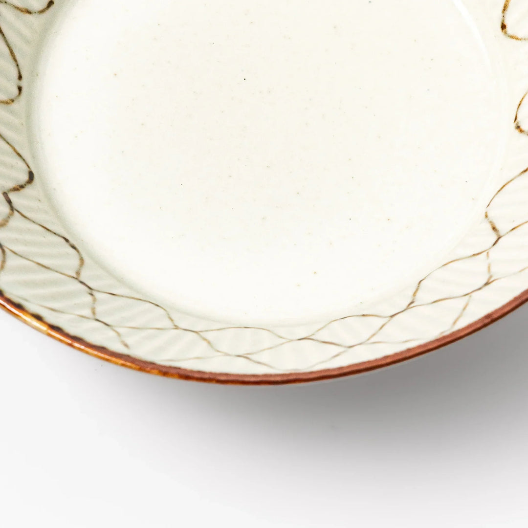 Japanese ceramic cereal bowl with rustic diamond weave pattern and earthy brown rim, perfect for breakfast or everyday dining