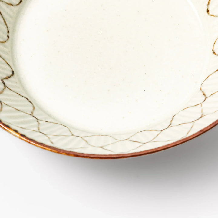 Japanese ceramic cereal bowl with rustic diamond weave pattern and earthy brown rim, perfect for breakfast or everyday dining