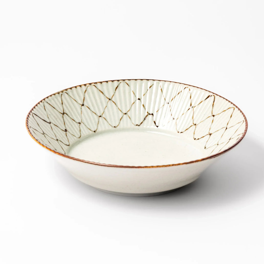 Japanese ceramic pasta bowl with rustic diamond weave pattern, earthy brown rim, and textured design for modern dining