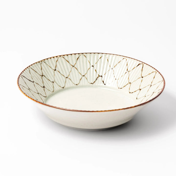 Japanese ceramic pasta bowl with rustic diamond weave pattern, earthy brown rim, and textured design for modern dining
