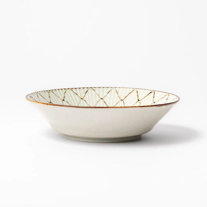 Japanese ceramic pasta bowl with rustic diamond weave pattern, earthy brown rim, and textured design for modern dining