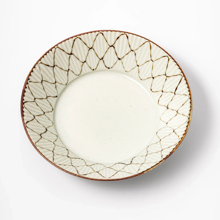 Japanese ceramic pasta bowl with rustic diamond weave pattern, earthy brown rim, and textured design for modern dining