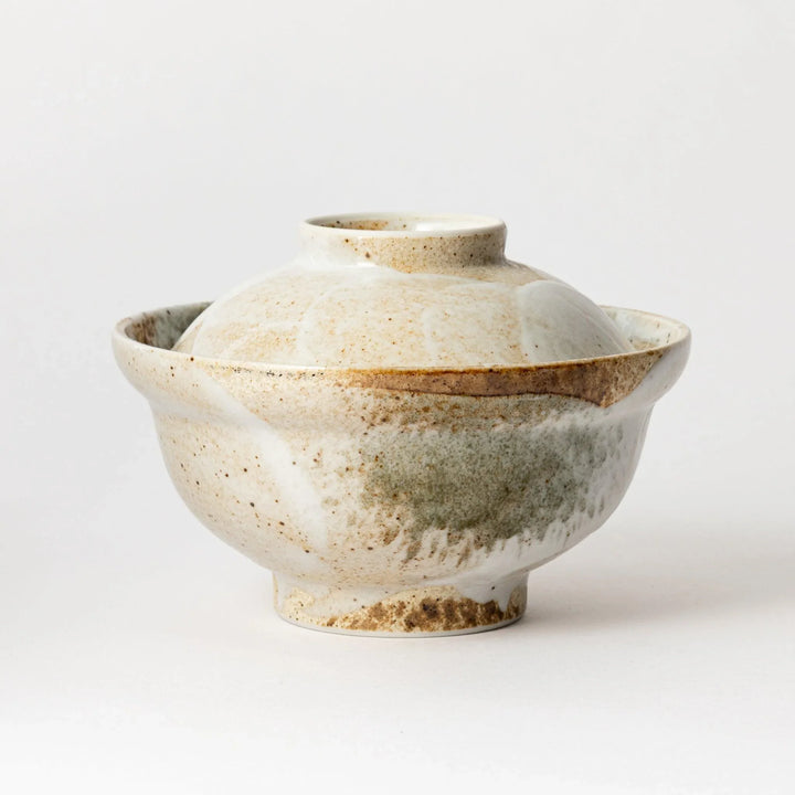Top view of the rustic donburi bowl, showcasing its speckled surface and beautiful lid, perfect for keeping food warm.