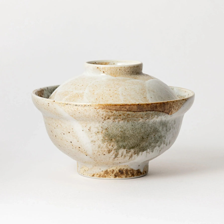 Top view of the rustic donburi bowl, showcasing its speckled surface and beautiful lid, perfect for keeping food warm.