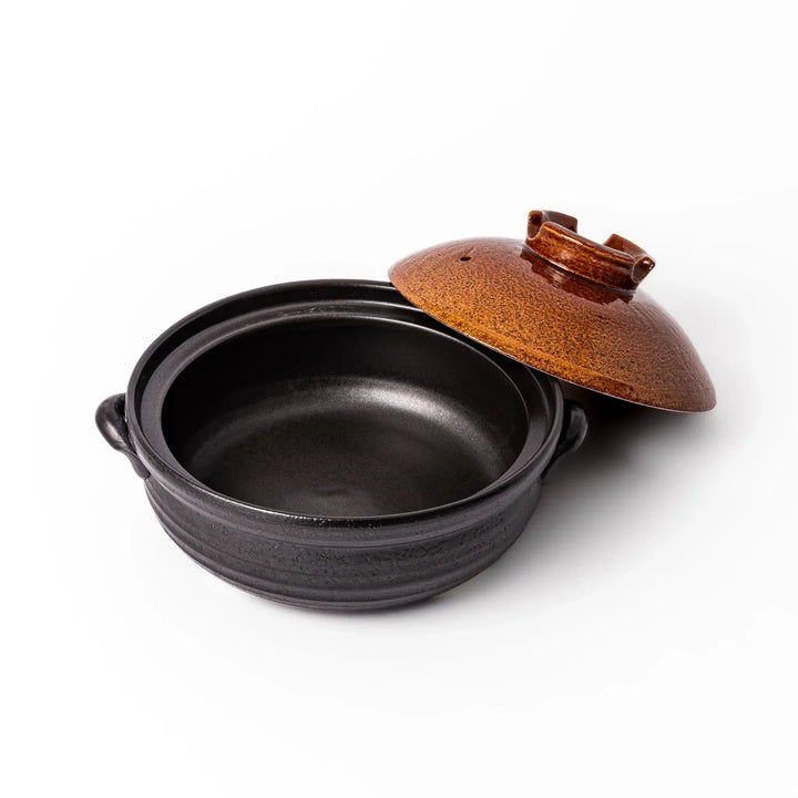 Japanese donabe clay pot with brown glazed lid and black base induction compatible for 2 to 3 person hot pot.