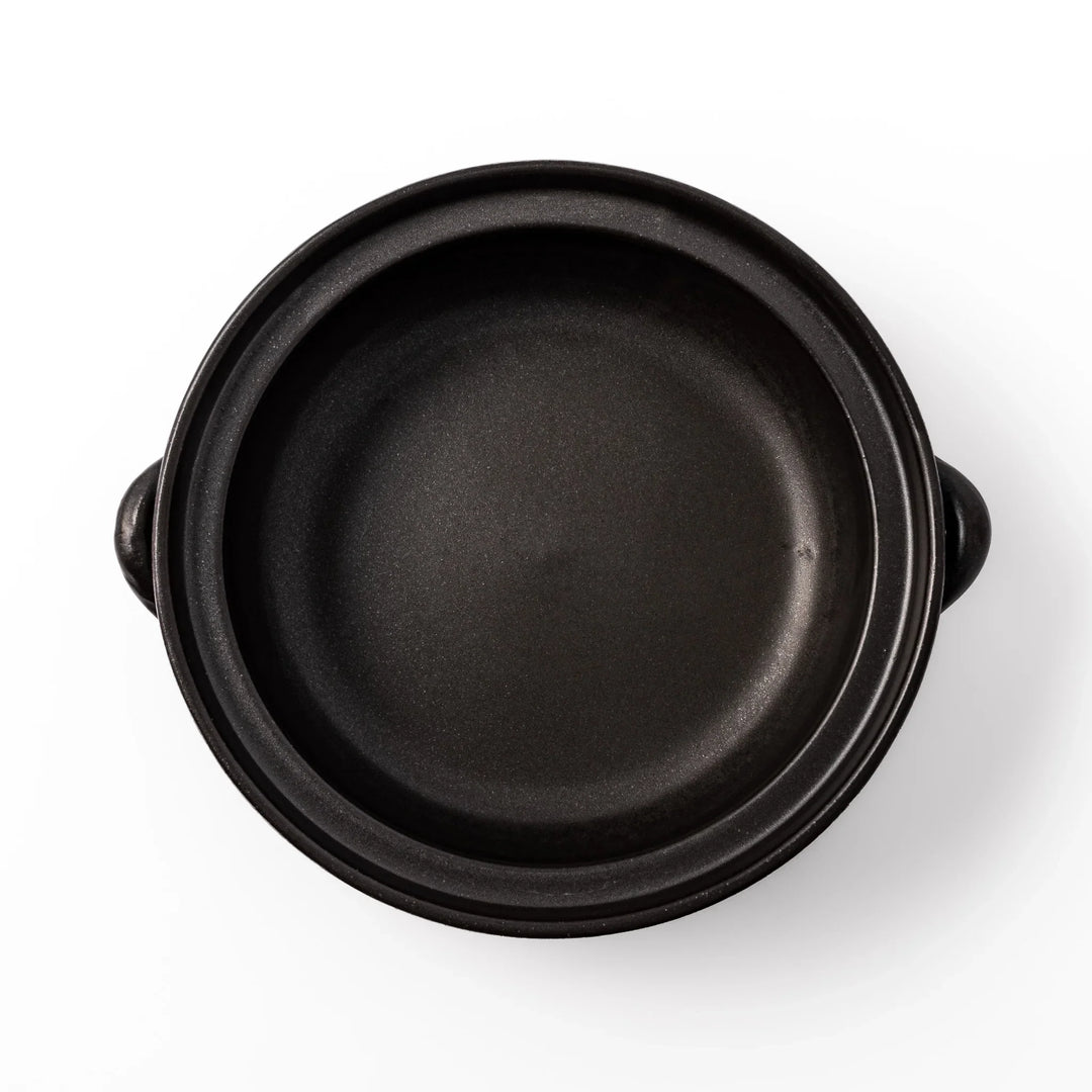 Japanese donabe clay pot with brown glazed lid and black base induction compatible for 2 to 3 person hot pot.