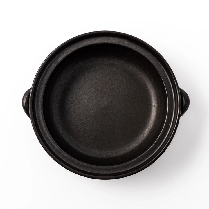 Japanese donabe clay pot with brown glazed lid and black base induction compatible for 2 to 3 person hot pot.