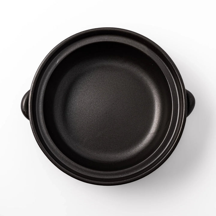 Japanese donabe clay pot with brown glazed lid and black base induction compatible for family hot pot.