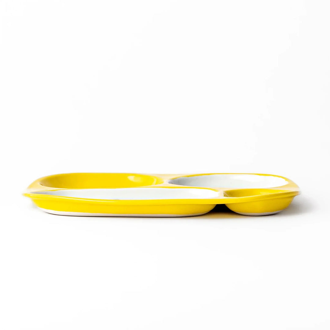 White ceramic kids divided plate with smiling yellow giraffe, tree and bird motifs, vibrant yellow sections