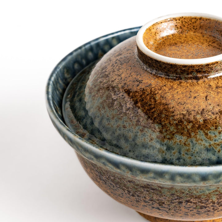 Ceramic donburi bowl with brown and blue reactive glaze and lid perfect for rice noodle or soup dishes.
