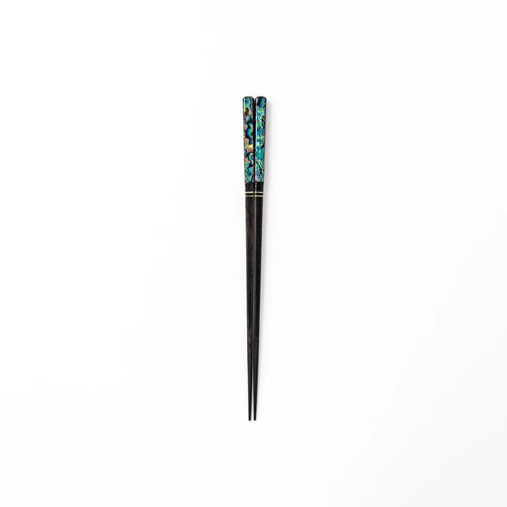 Japanese black lacquer chopsticks with shimmering abalone shell inlay, handcrafted for refined and elegant dining.
