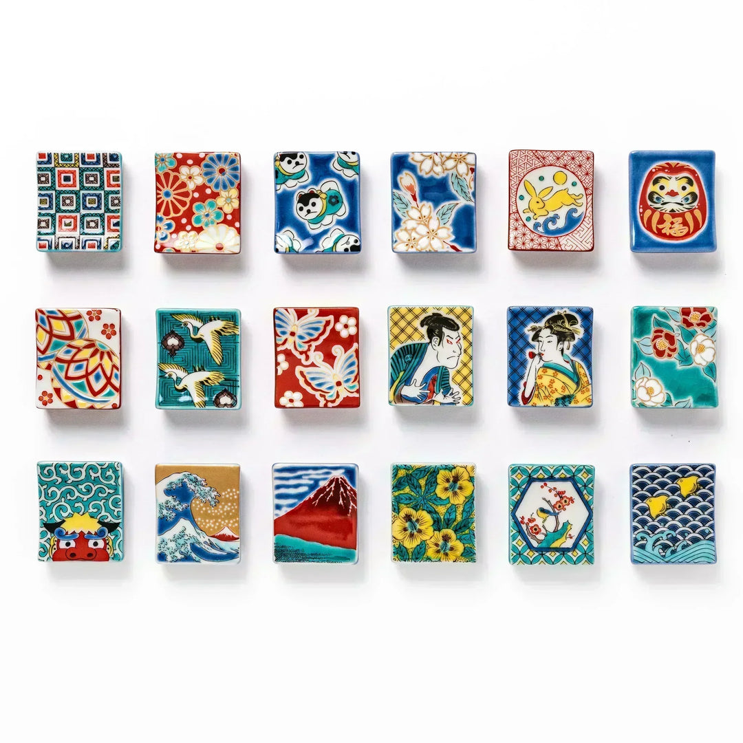 Japanese ceramic chopstick rests with traditional motifs like waves Mt Fuji florals animals and lucky symbols.
