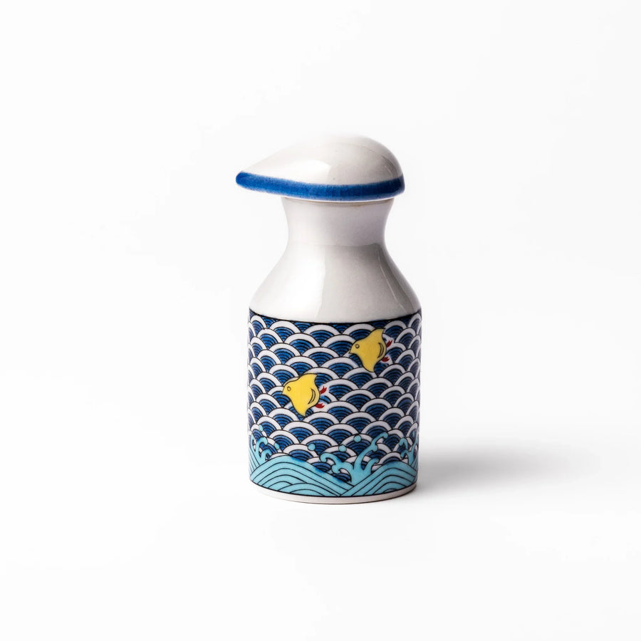 Japanese ceramic soy sauce dispenser with blue wave pattern and yellow shorebirds for traditional dining.