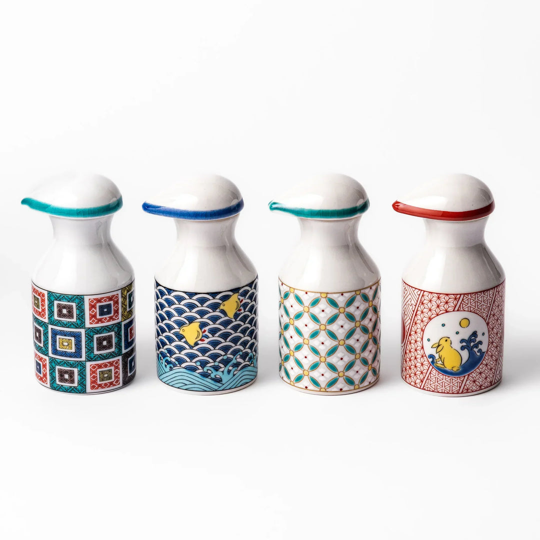 Japanese ceramic soy sauce dispensers with colorful patterns like waves shorebirds and geometric designs.