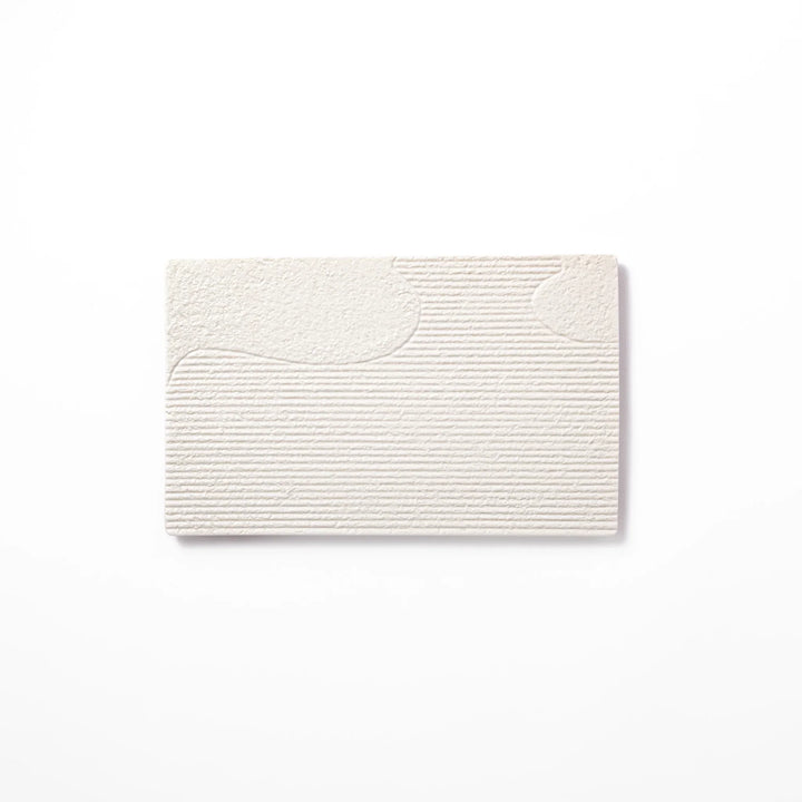 White Japanese ceramic dinner plate with ridged texture and matte gloss contrast for refined elegant dining.