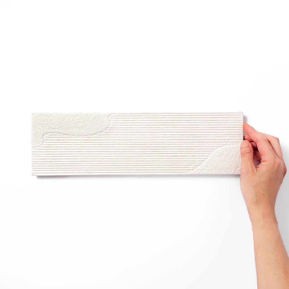 Rectangular white Japanese ceramic serving plate with ridged texture and matte gloss contrast for dining.