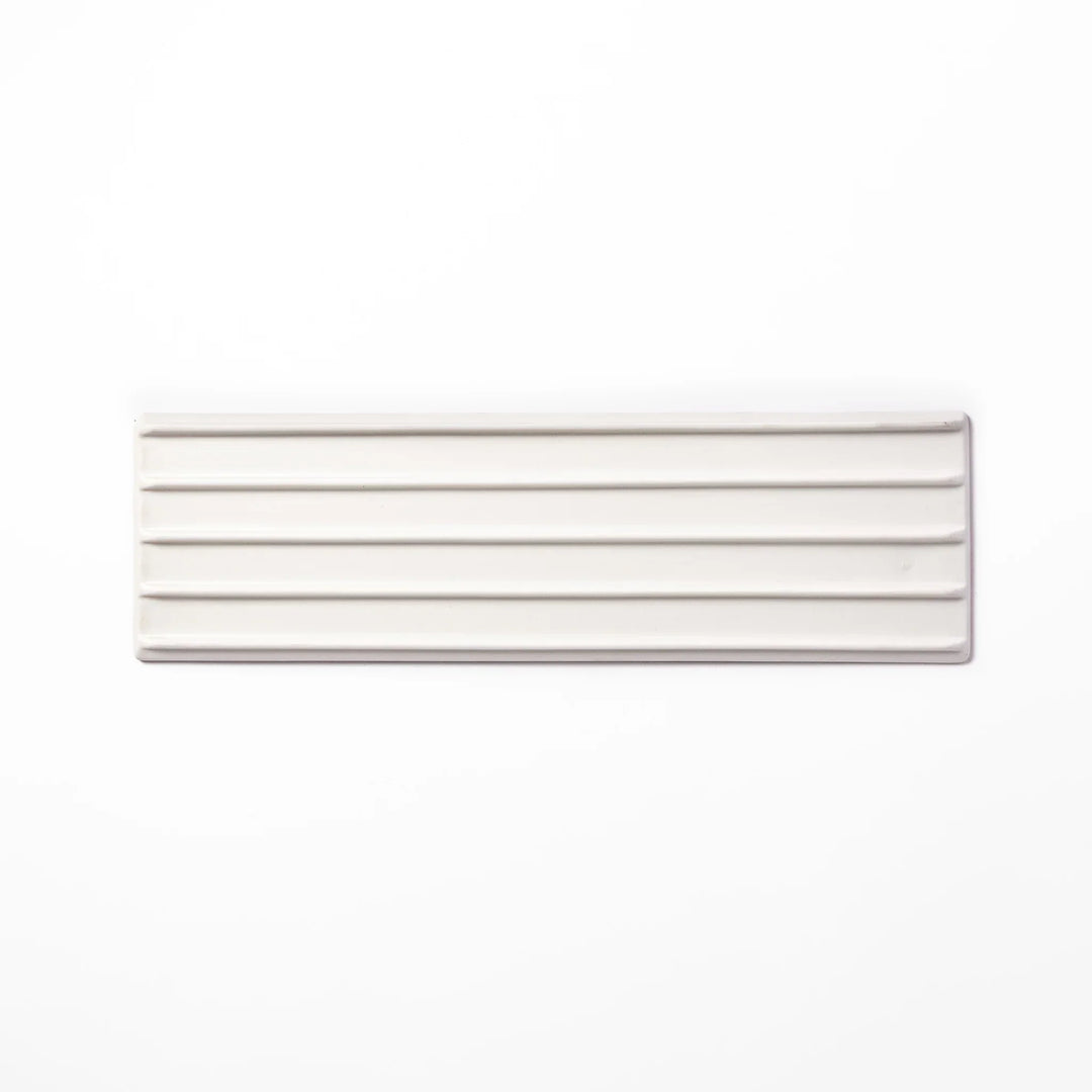 Rectangular white Japanese ceramic serving plate with ridged texture and matte gloss contrast for dining.