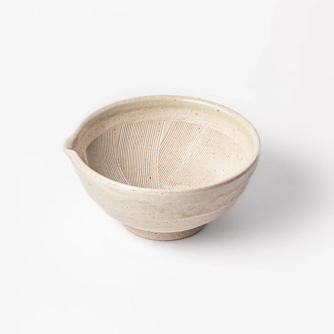 Soft sage-colored mortar with a speckled Hiwa glaze and grooved interior, perfect for grinding sesame or spices.