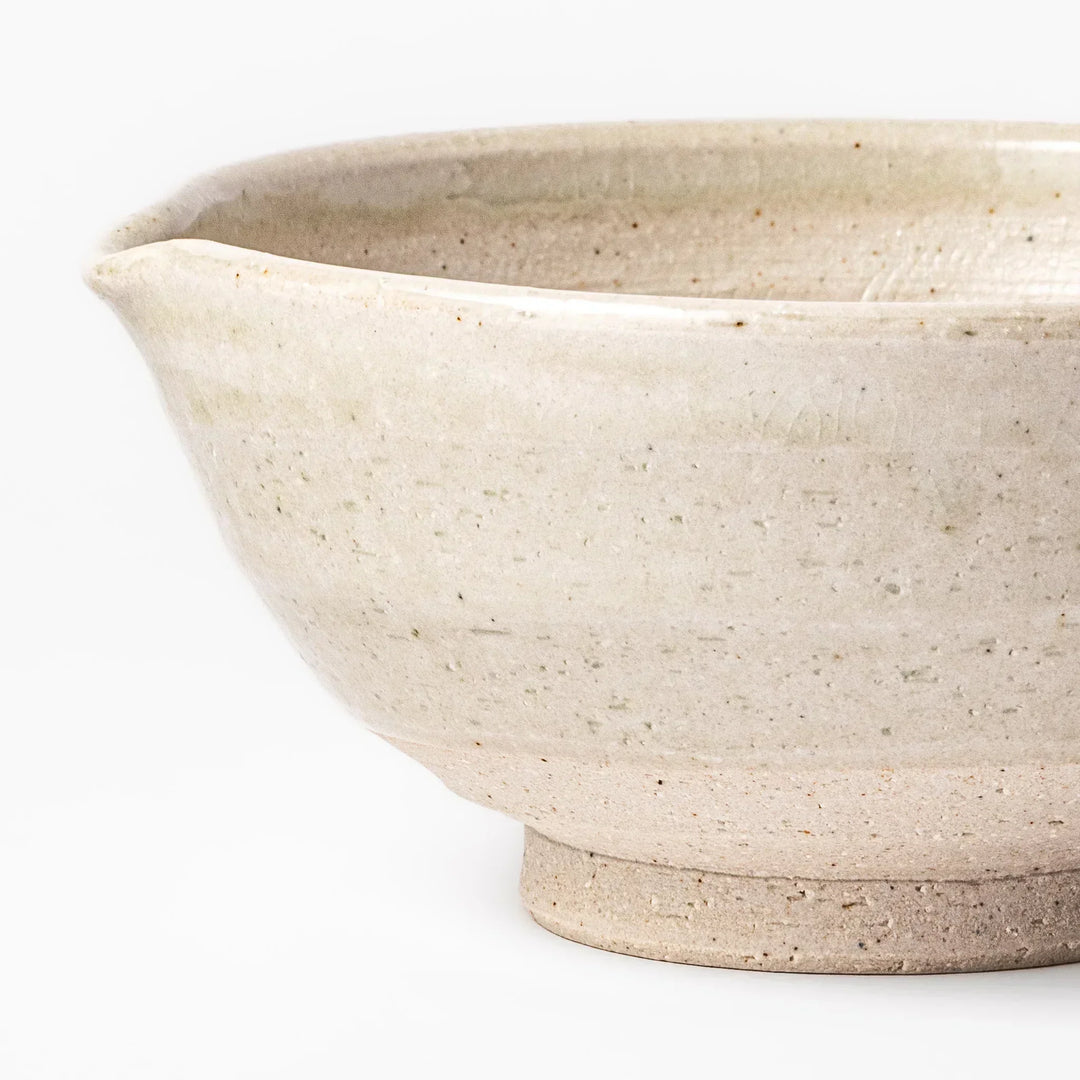 Soft sage-colored mortar with a speckled Hiwa glaze and grooved interior, perfect for grinding sesame or spices.