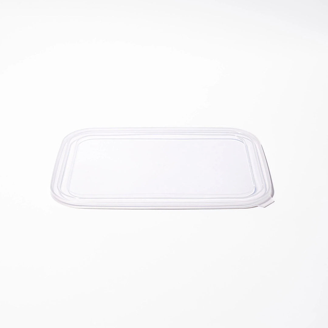Transparent lids for stainless prep trays with snug fit and durable seal, ideal for efficient food storage.