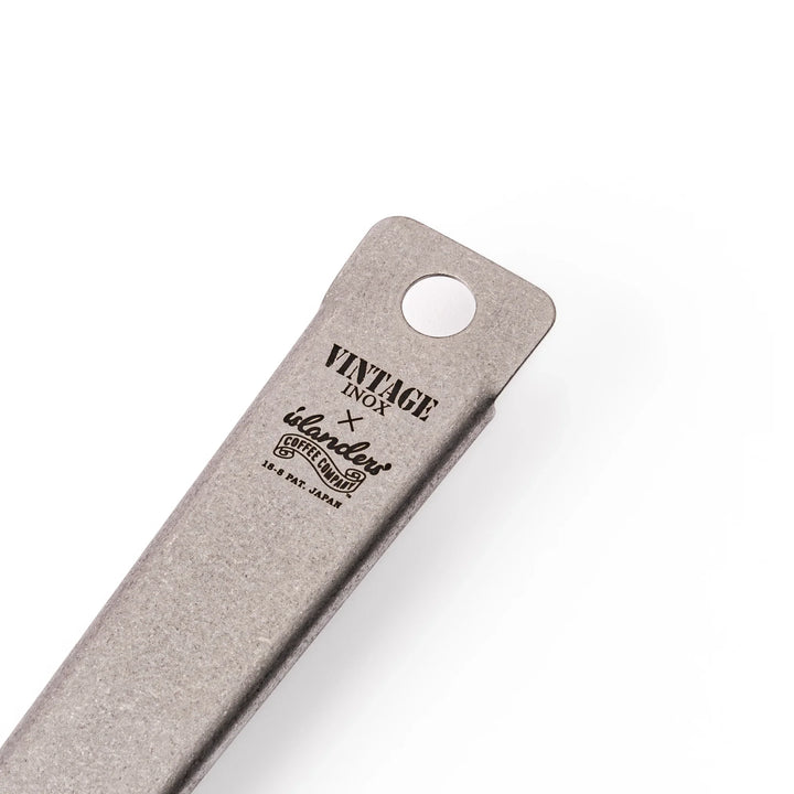 Japanese stainless steel kitchen shears with sharp blades and grip for cutting meat seafood and vegetables.