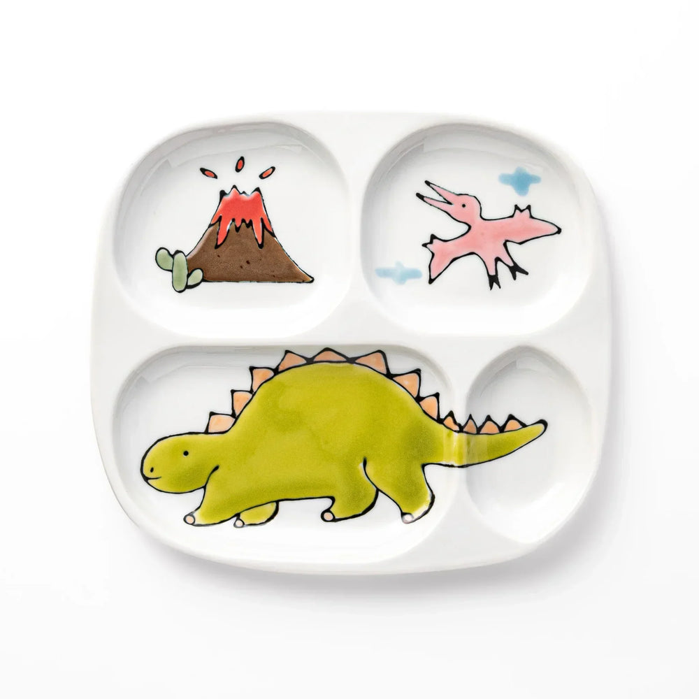 White ceramic kids divided plate with green stegosaurus, red erupting volcano, pink pterodactyl and blue cloud motifs
