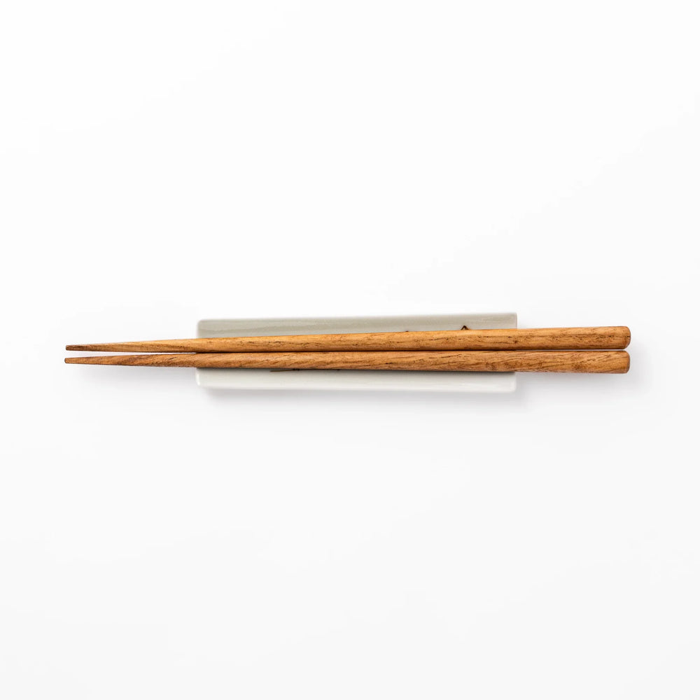 Japanese porcelain chopstick rest with whimsical Egypt design featuring pyramid, camel, cactus, and colorful palm trees