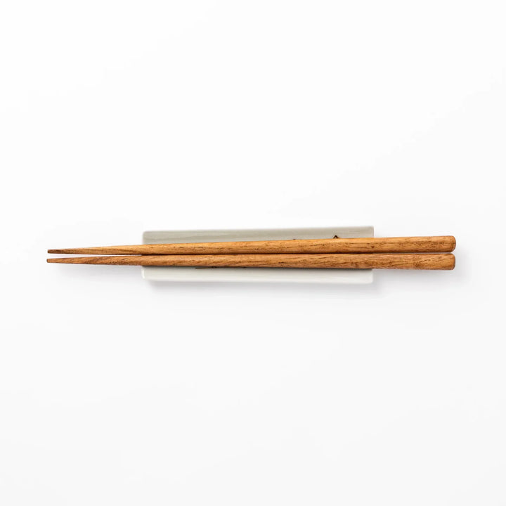 Japanese porcelain chopstick rest with whimsical Egypt design featuring pyramid, camel, cactus, and colorful palm trees