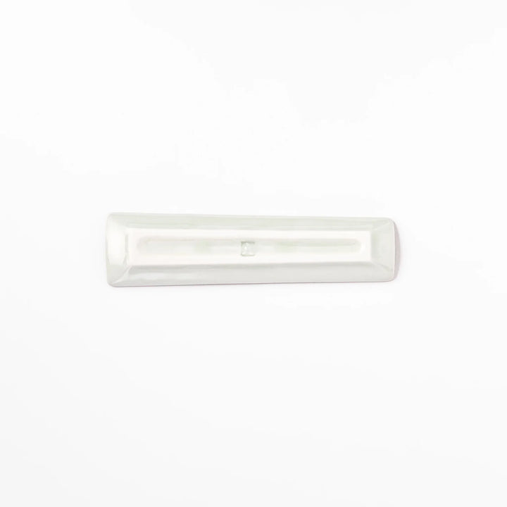 Japanese porcelain chopstick rest with whimsical Egypt design featuring pyramid, camel, cactus, and colorful palm trees