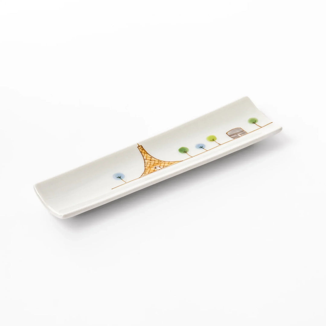 Japanese porcelain chopstick rest with whimsical France design featuring Eiffel Tower, Arc de Triomphe, and colorful trees