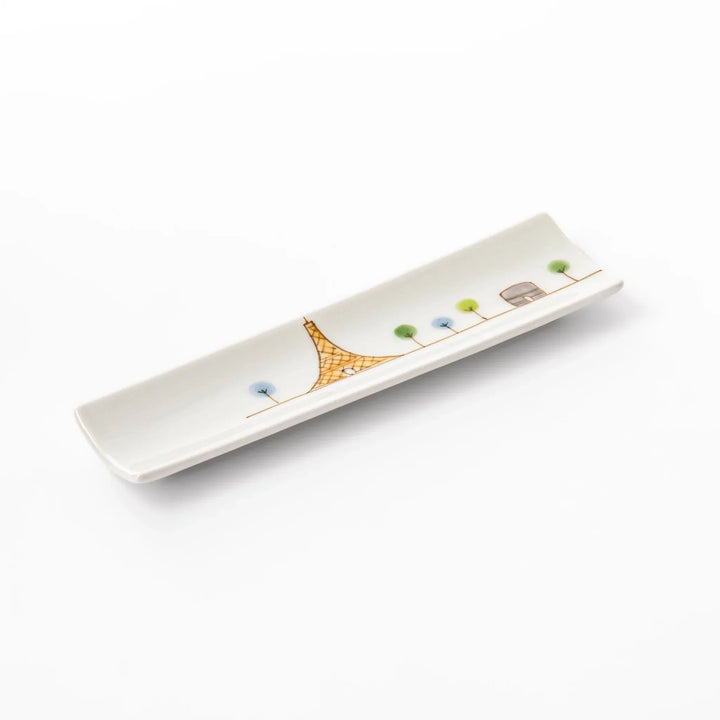 Japanese porcelain chopstick rest with whimsical France design featuring Eiffel Tower, Arc de Triomphe, and colorful trees