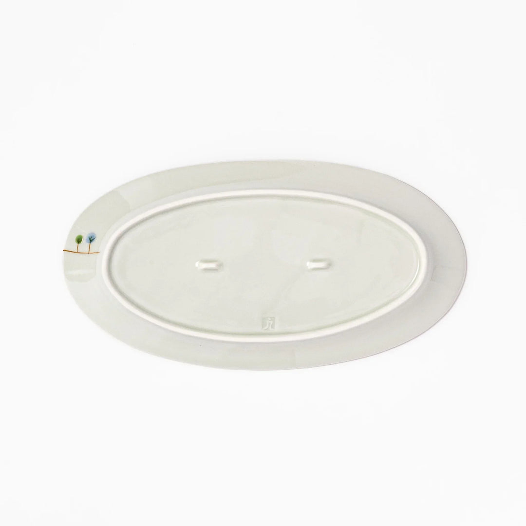 Japanese porcelain oval plate with whimsical Netherlands design featuring colorful houses, tulips, trees, and a blue windmill