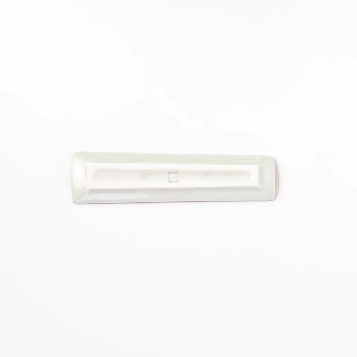 Japanese porcelain chopstick rest with USA design featuring Statue of Liberty, red bridge, and colorful cityscape accents