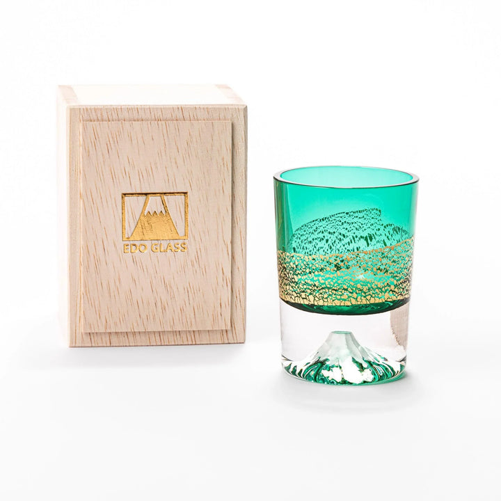 Green sake glass with gold-leaf mountain design and Mount Fuji base, combining elegance and Japanese artistry.