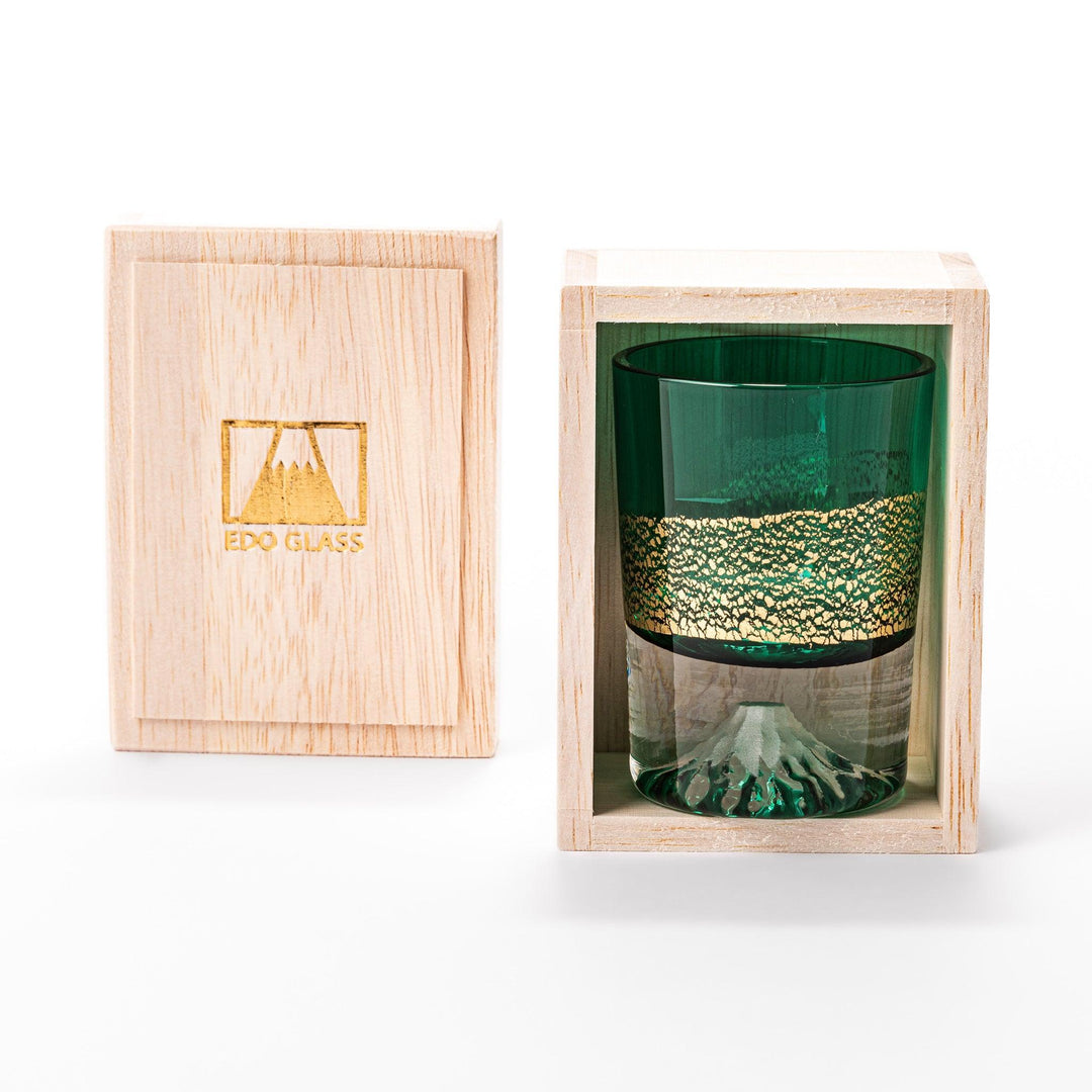 Green sake glass with gold-leaf mountain design and Mount Fuji base, combining elegance and Japanese artistry.