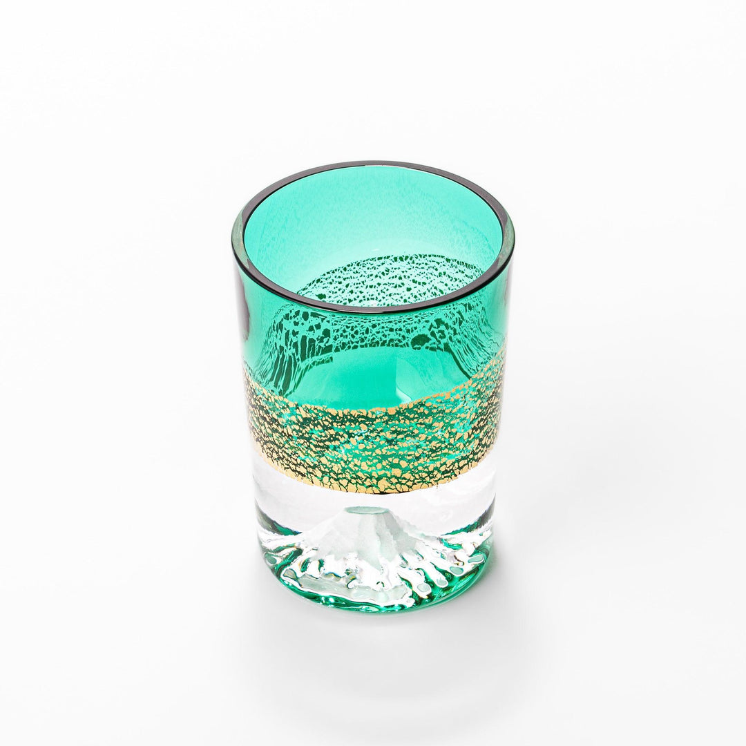 Green sake glass with gold-leaf mountain design and Mount Fuji base, combining elegance and Japanese artistry.