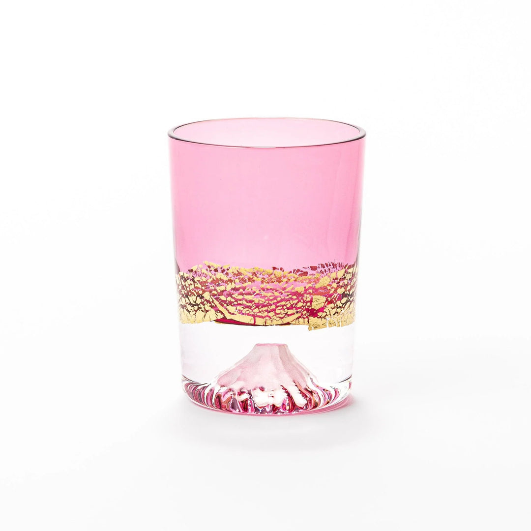 Pink sake glass with gold-leaf mountain and Mount Fuji base, perfect for festive and elegant occasions.
