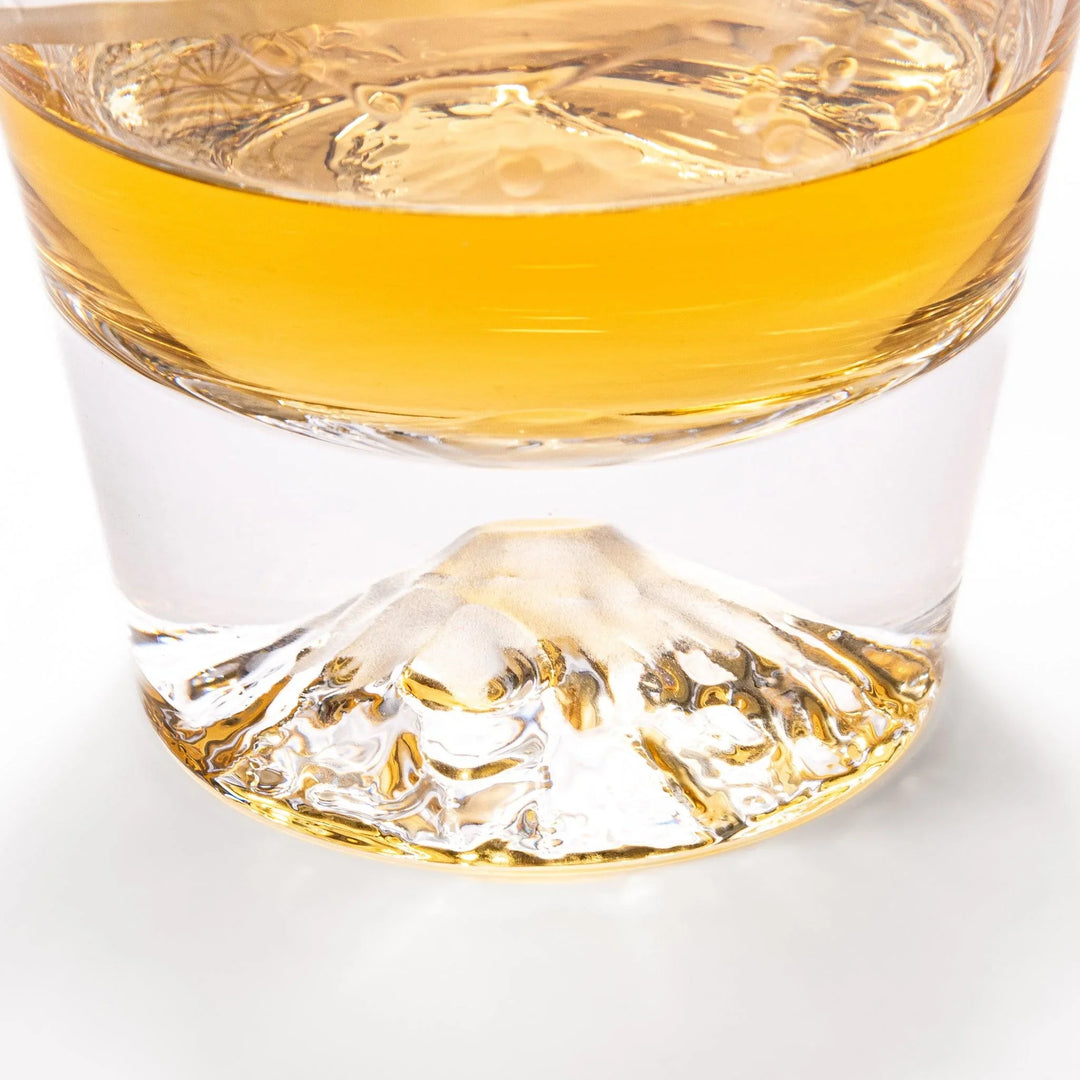 Clear rocks glass featuring dotted geometric circles, swirling line detail, and textured 3D Mount Fuji base for cocktails.