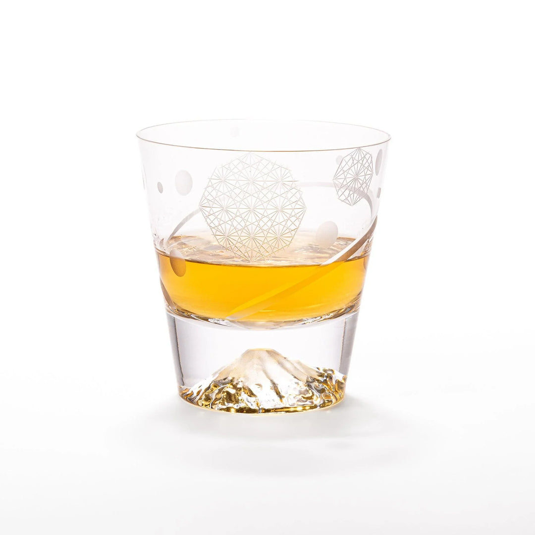 Clear rocks glass featuring dotted geometric circles, swirling line detail, and textured 3D Mount Fuji base for cocktails.

