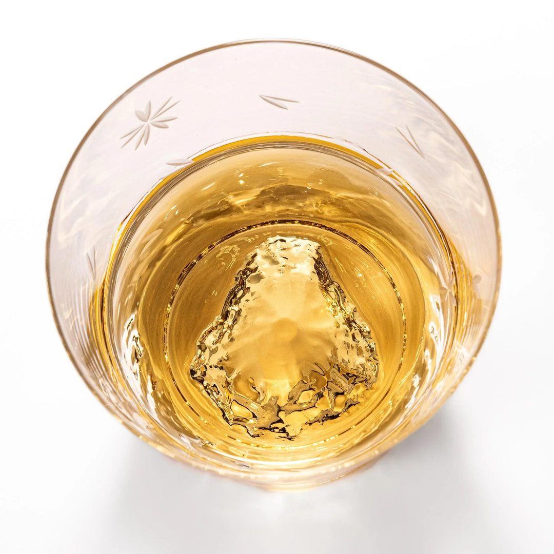 Two Edo glass whiskey cups in wooden box with Mount Fuji base design showcasing Japanese craftsmanship.
