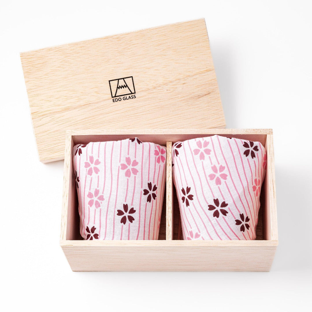 Two Edo glass whiskey cups in wooden box with Mount Fuji base design showcasing Japanese craftsmanship.