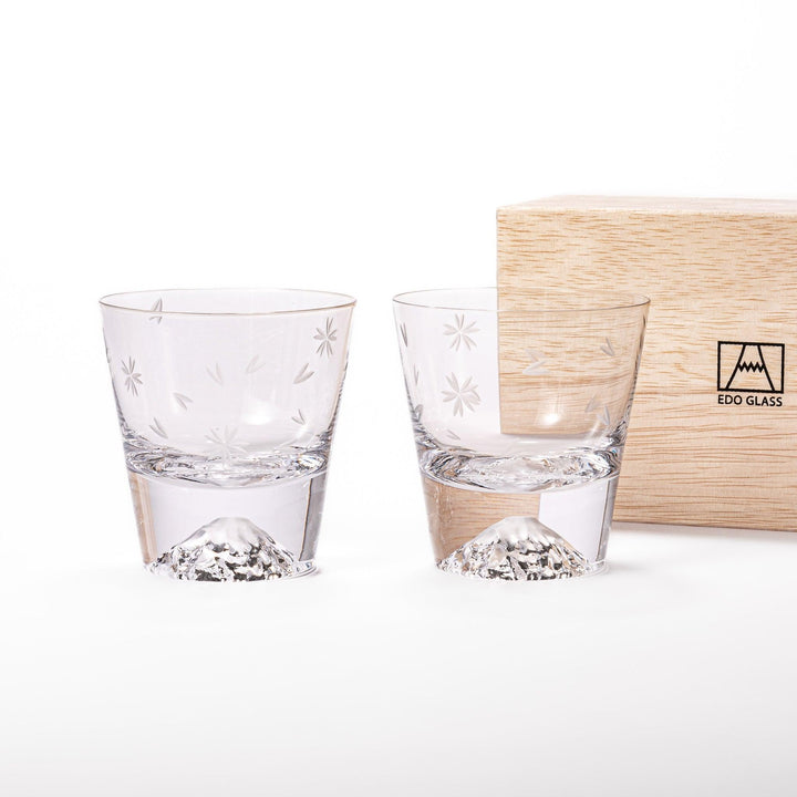 Two Edo glass whiskey cups in wooden box with Mount Fuji base design showcasing Japanese craftsmanship.
