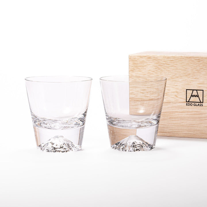 Two Edo glass whiskey cups in wooden box with Mount Fuji base design showcasing Japanese craftsmanship.