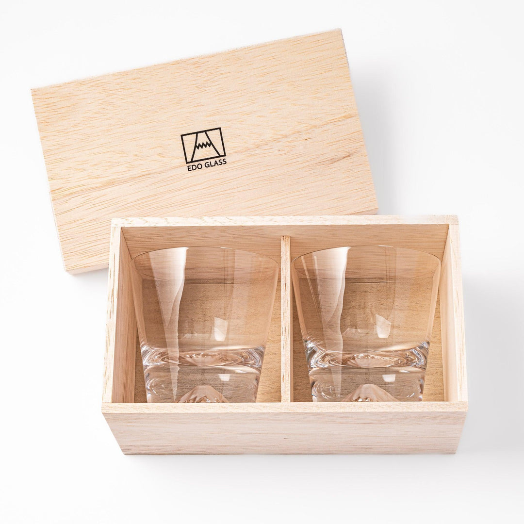 Two Edo glass whiskey cups in wooden box with Mount Fuji base design showcasing Japanese craftsmanship.