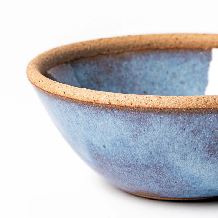 Terracotta blue ceramic dessert bowl with rustic brown rim, handcrafted in Japan for serving ice cream, fruit, or sides.