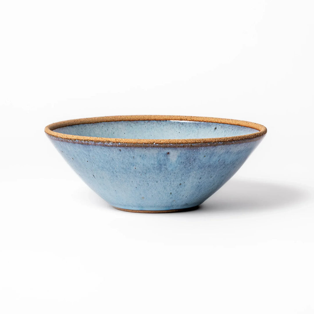 Terracotta blue ceramic pasta bowl with rustic brown rim, handcrafted in Japan for pasta, curry, or salads.