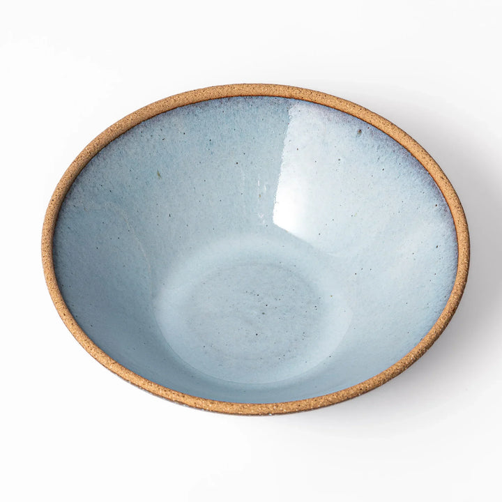 Terracotta blue ceramic pasta bowl with rustic brown rim, handcrafted in Japan for pasta, curry, or salads.