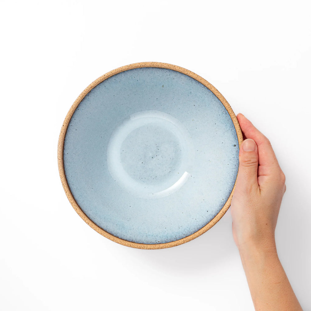 Terracotta blue ceramic pasta bowl with rustic brown rim, handcrafted in Japan for pasta, curry, or salads.