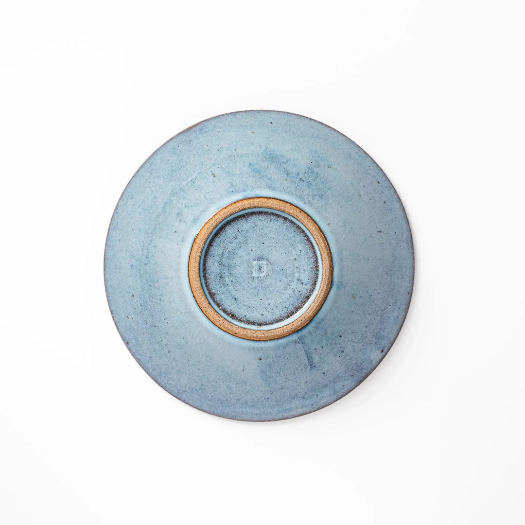 Terracotta blue ceramic pasta bowl with rustic brown rim, handcrafted in Japan for pasta, curry, or salads.