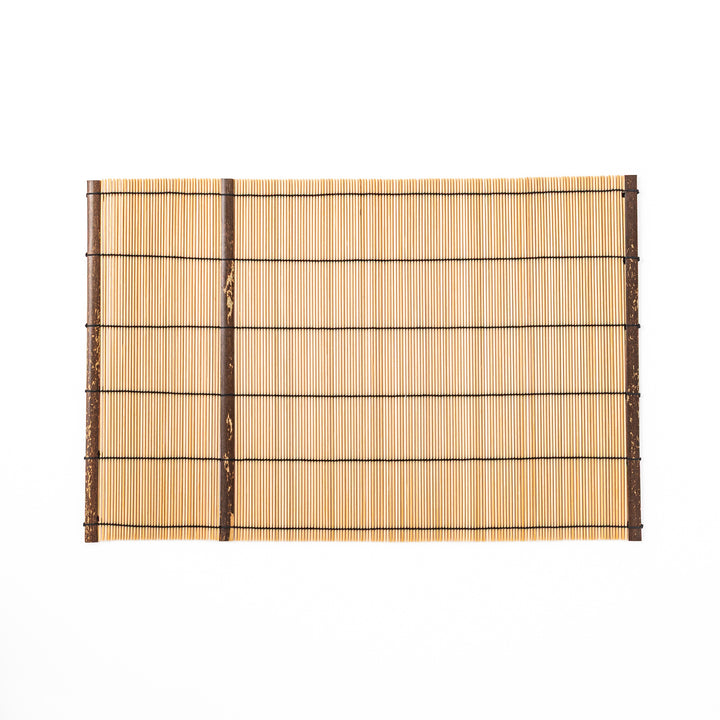 Japanese woven bamboo placemat in natural white tones with black thread accent for elegant dining table setup